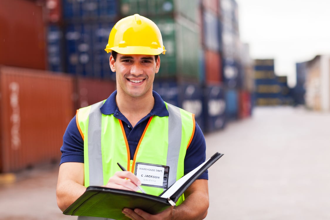 Portrait of harbor shipping container depot worker
